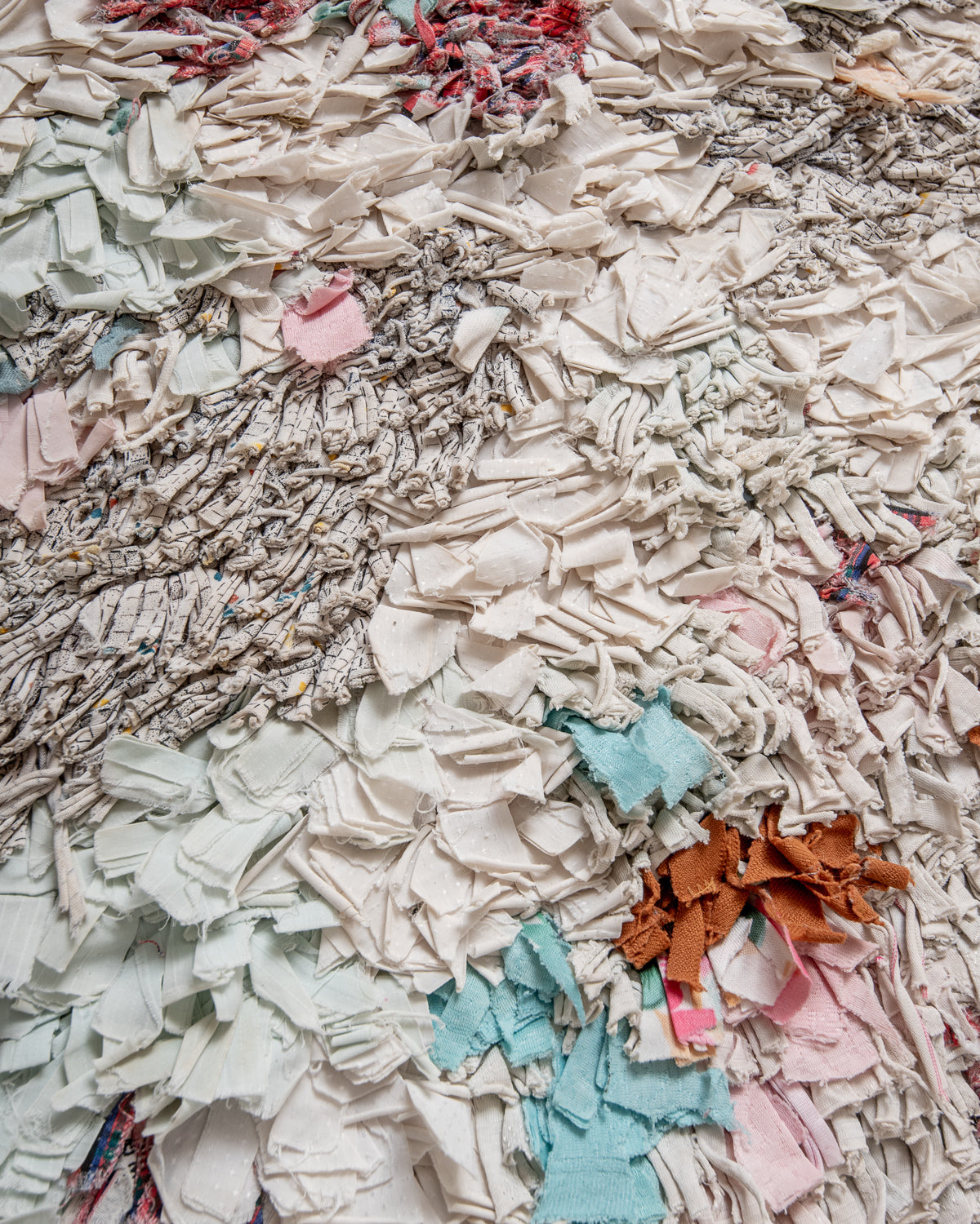 Modern designer vintage handcrafted Berber rug from Morocco. Boucherouite with beautiful colors and patterns.